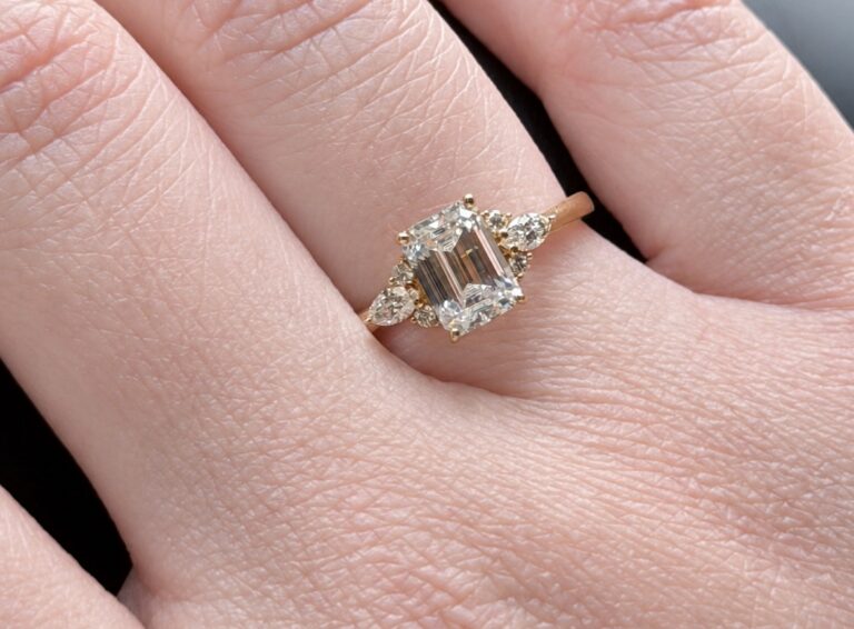 Client photo of Seven Stone Emerald Cut Moissanite Engagement Ring - Autumn