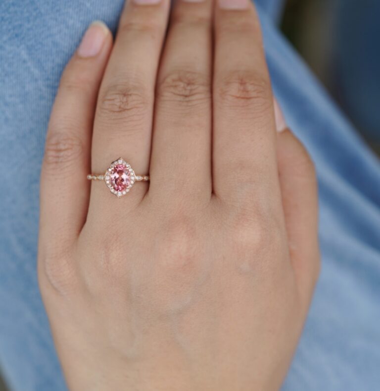 Client photo of Oval Floral Vintage Peach Sapphire Ring - Harmony